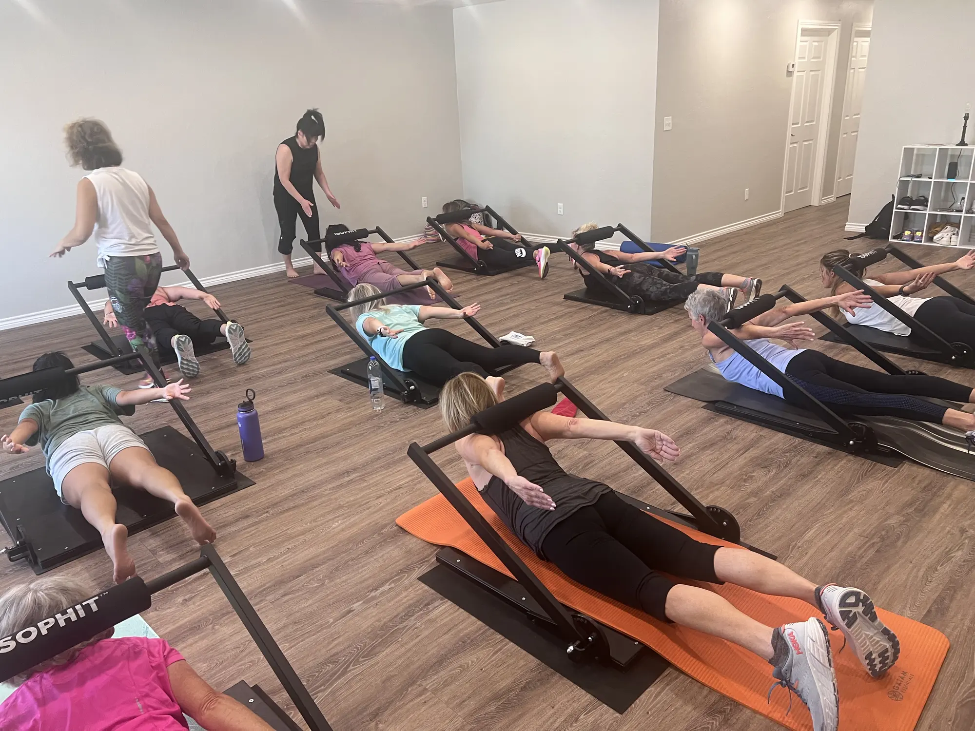 Members participating in a small group isometric training session